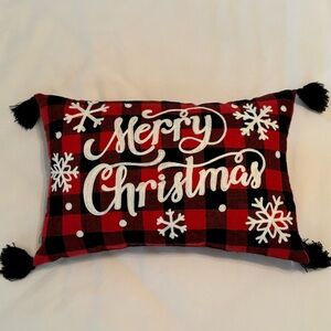 Like new red and black Buffalo check Christmas pillow. Size is 16 x 10.